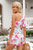 White Floral Single Bubble Sleeve Slant Shoulder Belted Romper Shewin